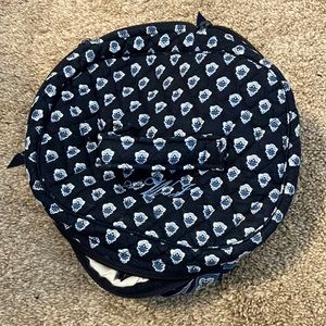 Vera Bradley round makeup bag with initials AWJ on the top